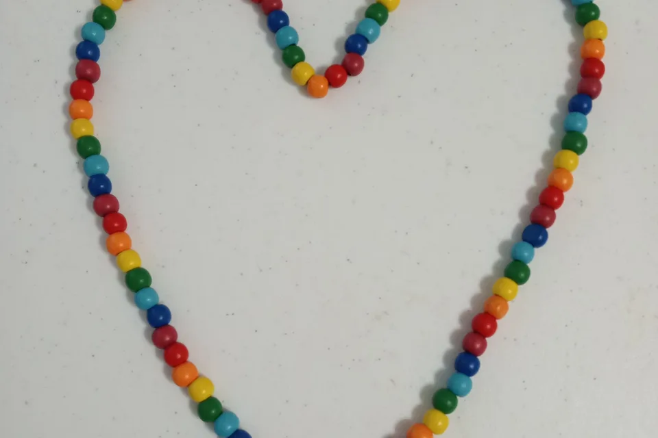 Rainbow heart-shaped bead necklace by Brainy J, selected as a documented reference for Kidcore